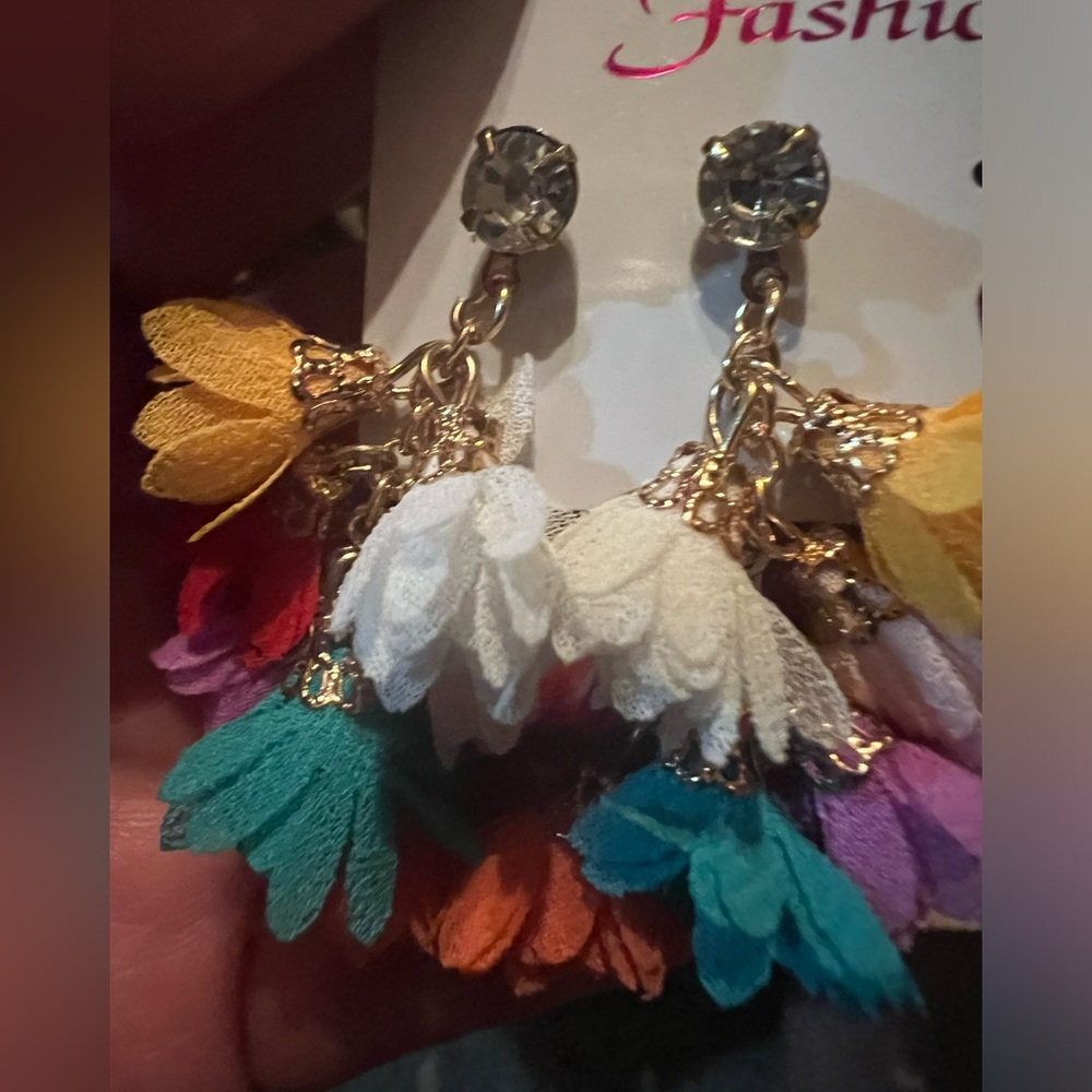 Multicolored floral gold tone earrings.